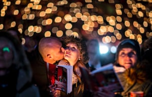 Berlin, Germany People attend the 'Weihnachtssingen' a candle-lit carol concert with 27,500 fans of the second-division club FC Union Berlin at the Alte Foersterei stadium