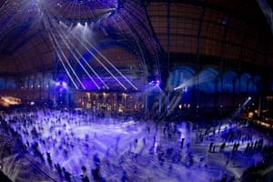 Paris, France People skate on the skating rink set up under the glass-roofed central hall of the Grand Palais