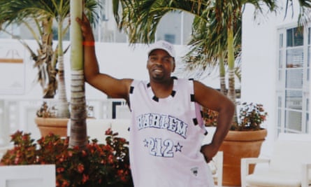 In this 2004 photo provided by Terri Scroggins, Victor Woods poses in Miami.
