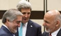 The US secretary of state, John Kerry speaks with Afghanistan's President Ashraf Ghani, right, and Chief Executive Abdullah Abdullah.