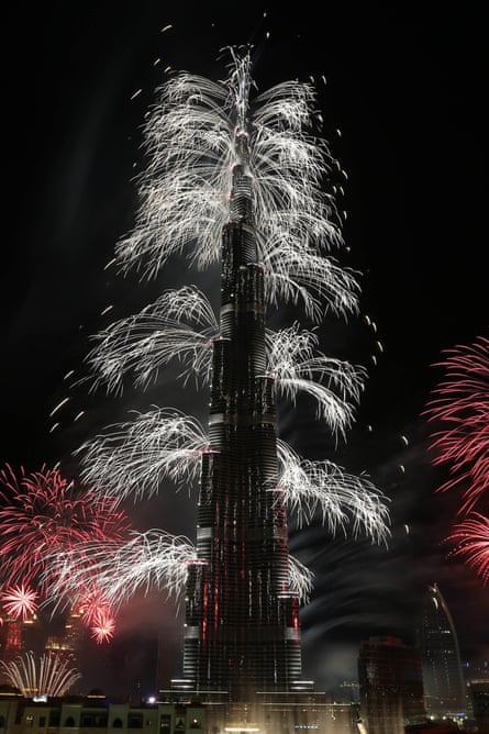 Fireworks explode from the Burj Khalifa, the world's tallest tower, in Dubai on January 1, 2014.