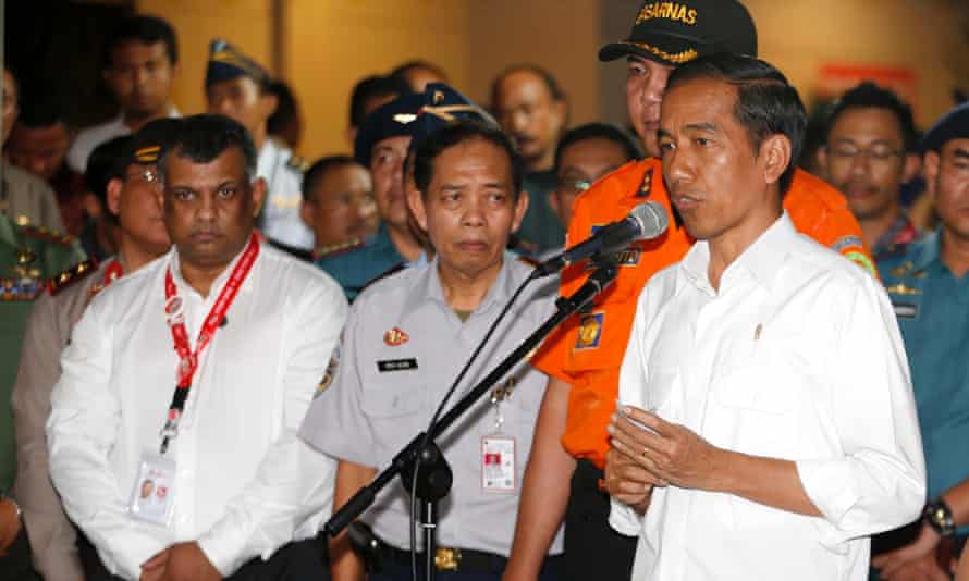 Indonesian president Joko Widodo talks to the media in Surabaya after meeting relatives of the missing AirAsia plane passengers.