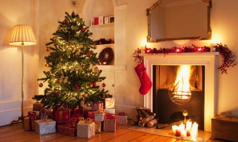 Two mulled wine glasses by the fireplace, christmas time Stock