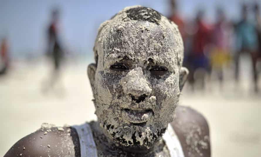 A man enjoys a day out on Mogadishu's Lido beach, which has become so popular again that lifeguards have been deployed.