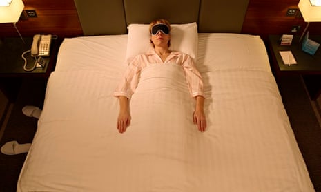 Woman asleep in eye-mask