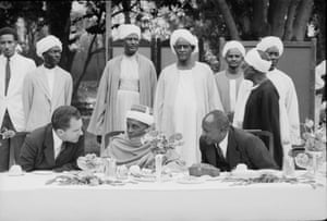 American politician US Vice President sits with Muslim leader Sayed Ali el Mirghani and Sudanese Prime Minister Abdullah Khalil at a state function, Sudan, March 1957.