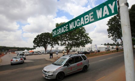 A motorist drives down a street in Harare named after the first lady.