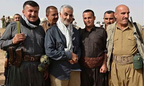 Qassem Suleimani with a group of peshmerga fighters in Kurdistan