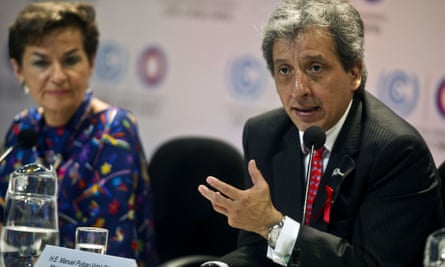 Peru's Minister of Environment Manuel Pulgar Vidal (R) speaks next to UNFCCC Executive Secretary Christina Figueres(L) during a press conference at the COP20 in Lima on December 01, 2014.