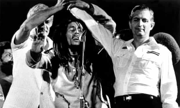 Bob Marley brings the Jamaican PM and opposition leader together on stage in a call of peace, at his