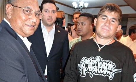 Pacific castaway Jose Salvador Alvarenga (right) shakes hands with Marshall Islands president