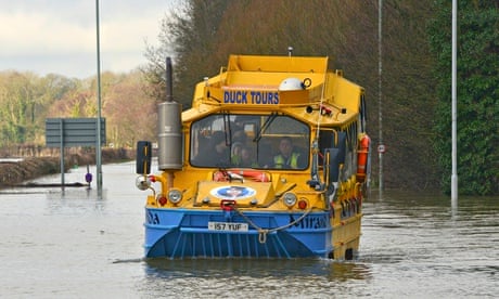 A duck boat was used on the Thames to rescue people after the river burst its banks.