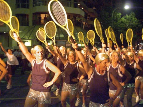Women dressed as French tennis star Amelie Mauresmo march in the Mardi Gras parade through  Sydney.