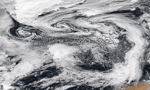 Composite satellite images from Nasa show three storms approaching the British Isles.