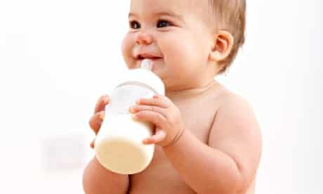 Baby drinking milk from a bottle