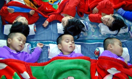 Triplets sleep at a government-run home in Wonsan city, Kangwon province, North Korea
