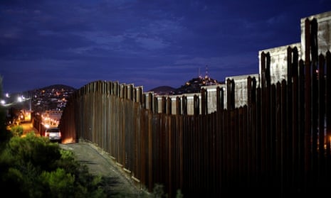  The border wall illuminated in Nogales, Arizona. mexico us 