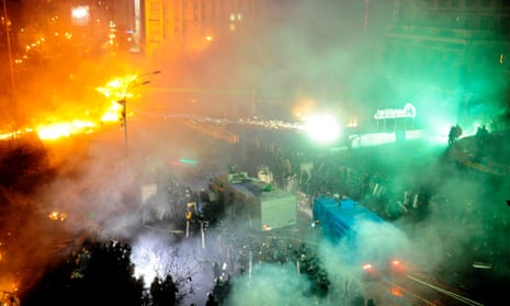Police, backed by water cannon, move in on anti-government protesters in central Kiev.