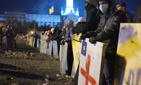 Anti-government protesters lining up earlier at their camp in Kiev's Independence Square.
