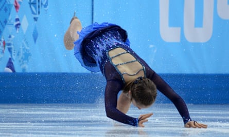 Russia's Julia Lipnitskaia falls as she performs in the women's figure skating short program at the Sochi Winter Olympics.