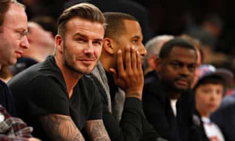 David Beckham watches the Miami Heat v New York Knicks basketball game 