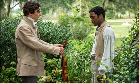 Benedict Cumberbatch, left, and Chiwetel Ejiofor in a scene from the film 12 Years a Slave