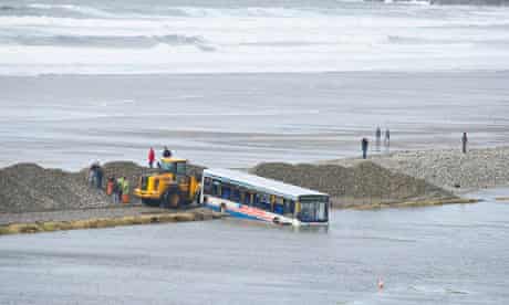Ten people were rescued from the bus that was partially submerged in Newgale, Pembrokeshire.