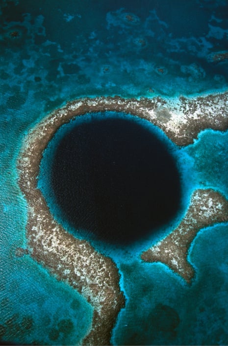 The Great Blue Hole, Belize, is a karst-eroded sinkhole, the result of the repeated collapses of a cave system formed during lower sea level stands.