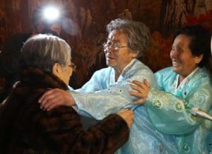 Kim Seong-yun, left, a 96-year-old South Korean woman, meets her North Korean sister Kim Seok-rye and other relatives.