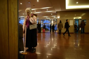 A South Korean woman makes a phonecall in a hotel before leaving for the North Korean border
