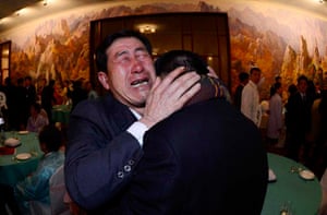 South Korean Park Yang-gon, left, meets his North Korean brother Park Yang-soo after being separated for 60 years