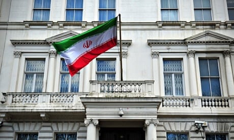 The Iranian flag hangs outside the Iranian embassy