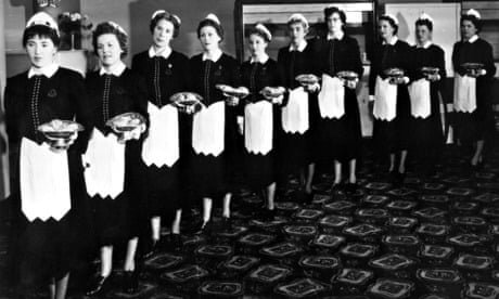 Black and white photo of 1950s waitresses.