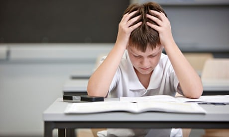 Boy struggling in exam