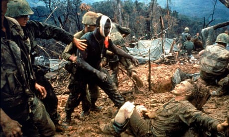 Wounded marine gunnery sargeant Jeremiah Purdie (C) with stricken comrades in sth Vietnam 1966