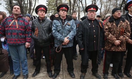 Pro-Russian Cossacks rally outside the Crimean parliament building on February 28, 2014 in Simferopol, Ukraine.