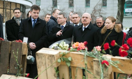 Foreign Ministers of the V4 countries Miroslav Lajcak (C-L to R) of Slovakia, Lubomir Zaoralek of the Czech Republic, Janos Martonyi of Hungary and Deputy Foreign Minister Katarzyna Pelczynska-Nalecz of Poland pay their tribute at a memorial for the protestors killed in clashes with the police in Independence Square in Kiev, Ukraine, 28 February 2014.
