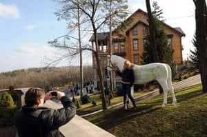 20 Photos: Visitors in front of the luxury residence of Viktor Yanukovych near Kiev