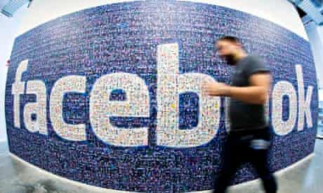 Facebook logo created with pictures of its users