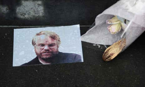 A makeshift memorial outside the apartment building where Philip Seymour Hoffman was found dead of an alleged drug overdose