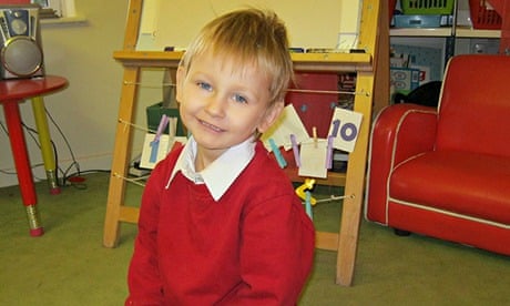Blond-haired Daniel Pelka pictured in a nusery or school in a red jumper
