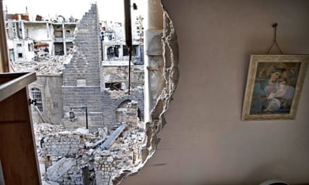 A partially destroyed wall of a house in Homs, Syria