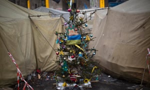 A christmas tree still stands in the middle of tents set by opposition supporters in Kiev's Independence Square, Ukraine.