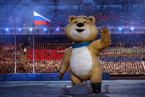 An 2014 Winter Olympic mascot, the Polar Bear waves at the audience.