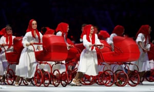 Dancers wearing red babushka's play the role of Mother Russia.