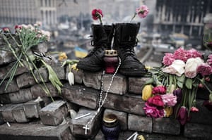 20 Photos: Boots on a makeshift memorial at Independence Square, Kiev
