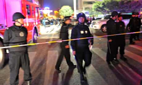 Police at Kunming rail station after knife attacks