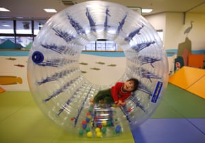 Two-year-old Sakuya Zui plays at an indoor playground which was built for children and parents who refrain from playing outside because of concerns about nuclear radiation in Koriyama, west of the tsunami-crippled Fukushima Daiichi nuclear power plant
