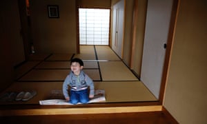 Five-year-old Atsunori Kaneta smiles at his home in Koriyama, west of the tsunami-crippled Fukushima Daiichi nuclear power plant.