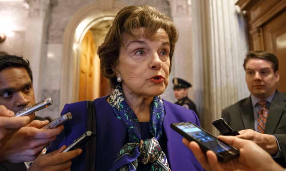 Senator Dianne Feinstein speaks to reporters after accusing the CIA of cover-up and criminal activity in a speech on the Senate floor.